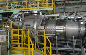 The full-scale combustor test stand at IHI's Aioi Works facility in Hyogo, Japan, engineered to replicate GE Vernova F-class gas turbine operating conditions — including pressure, temperature, and air and fuel flow rates. IHI and GE Vernova used the stand to demonstrate 100% ammonia combustion on March 18, 2026. Courtesy: IHI/GE Vernova